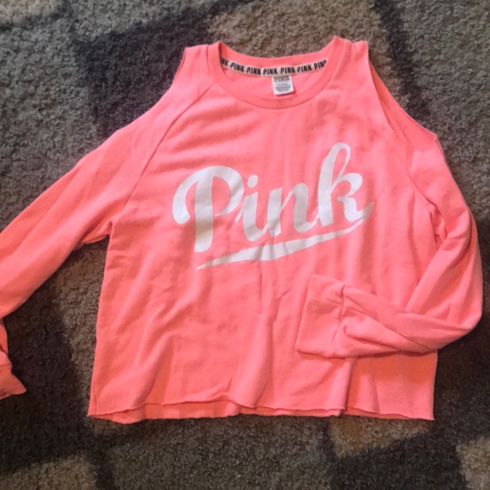 Pink sweatshirt with cutout shoulders